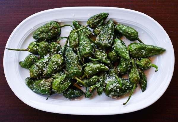 green peppers on white plate